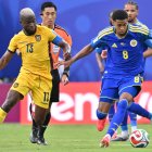 Enner Valencia y Livano Comenencia de Curazao en el estadio de Kansas.