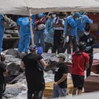 Equipos trabajan en la gestión de cuerpos tras el terremoto en Venezuela.