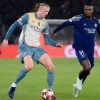 Erling Haaland (i) y Willian Pacho (d) se enfrentaron en enero de 2025, por la Champions, con triunfo del PSG.