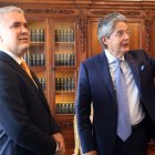 El expresidente colombiano Iván Duque y el expresidente de Ecuador, Guillermo Lasso, es una visita protocolar al Palacio de Carondelet, en Quito, en 2021.