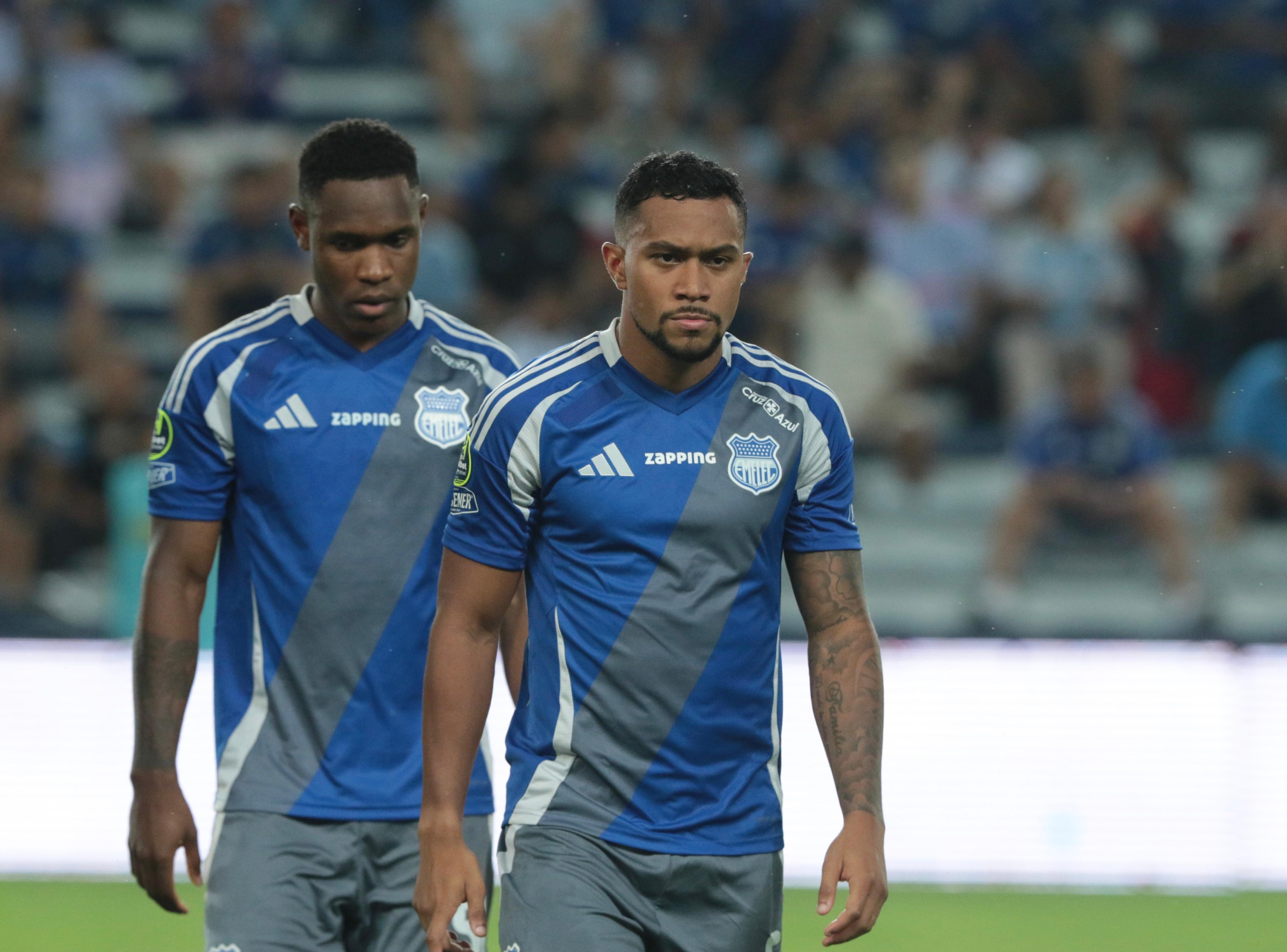 Emelec players in action against Guayaquil City FC, with a determined look on their faces